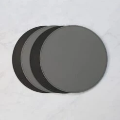 Set Of 4 Black & Grey Faux Leather Reversible Round Placemats